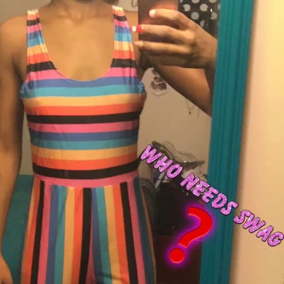 Rainbow jumpsuit
Size small stretchy - Picture 1 of 3